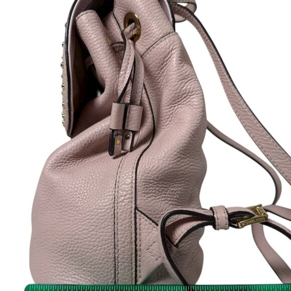 Michael Kors Riley small pebbled leather flap backpack in a light pink color main image 2